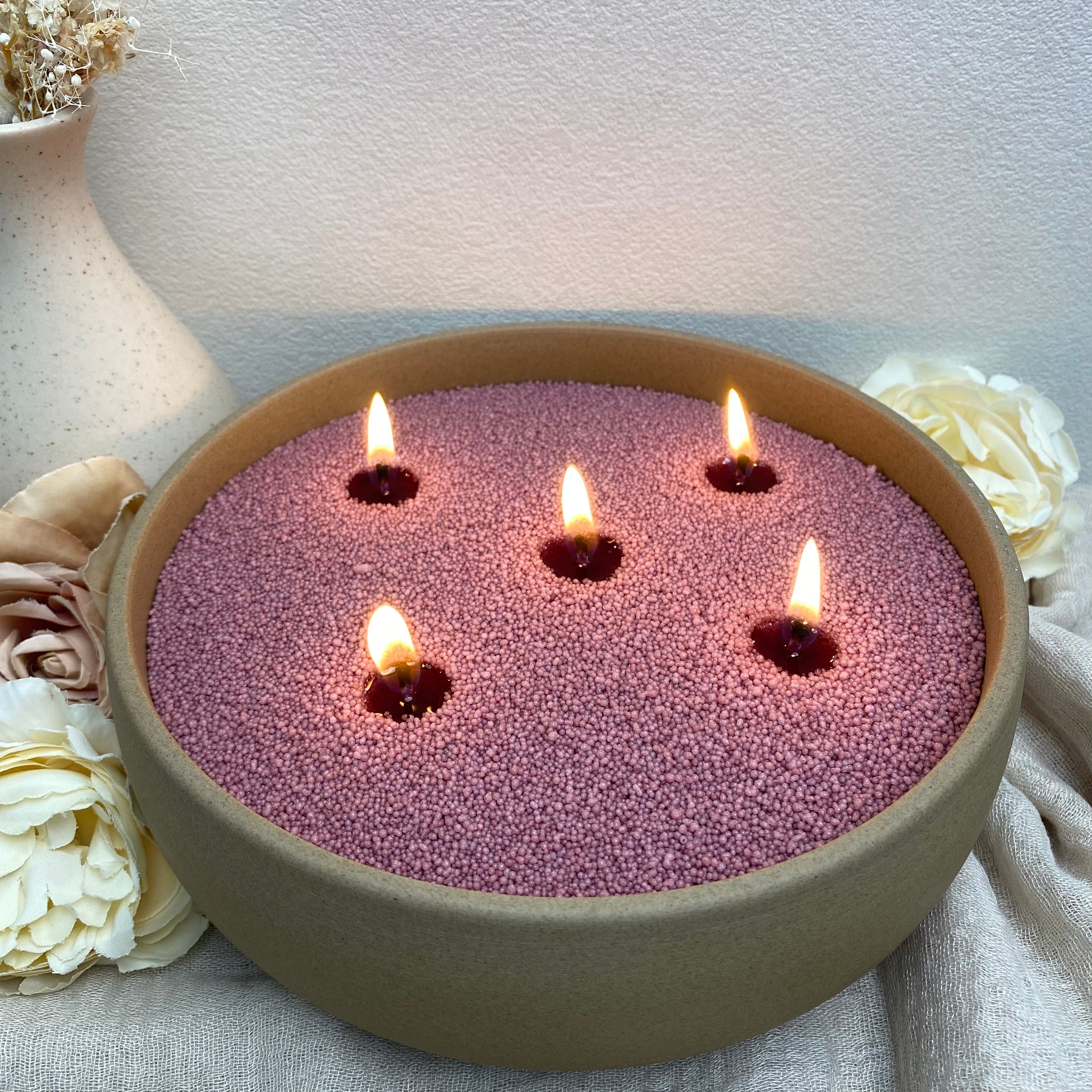 Desert Rose pearled candle wax in a warm ivory ceramic bowl styled in a soft, cozy neutral home setting.