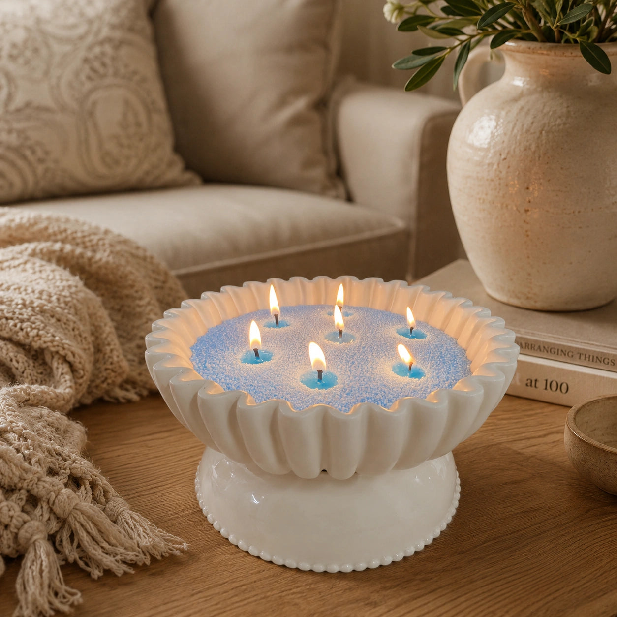 baby blue pearled candle wax displayed in a warm home vessel scene