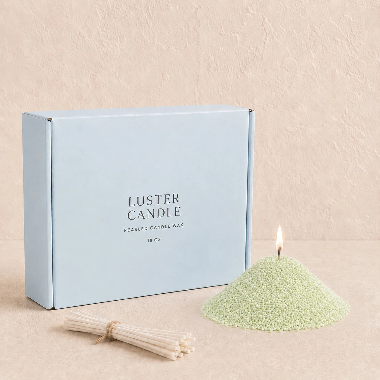 Lemon Yellow Pearled Candle Wax with milk blue Luster Candle box, pearled candle wax mound, cotton wick bundle, and soft flame.