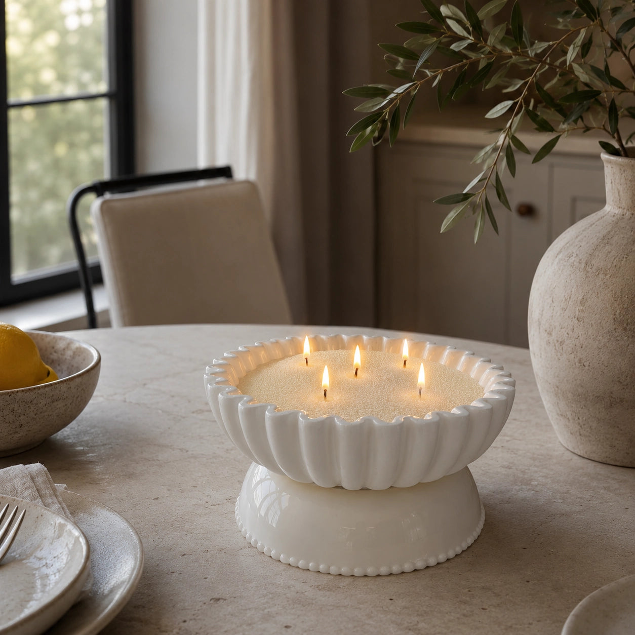 lemon yellow pearled candle wax displayed in a warm home vessel scene