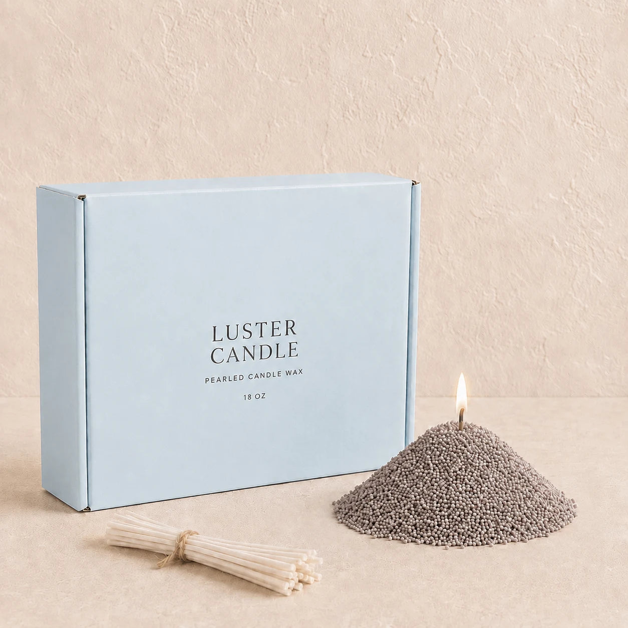 Mist Grey Pearled Candle Wax with milk blue Luster Candle box, pearled candle wax mound, cotton wick bundle, and soft flame.