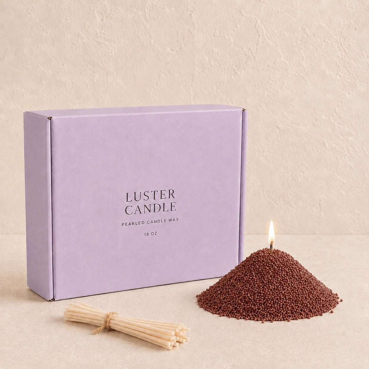 Mocha Brown Pearled Candle Wax with milk blue Luster Candle box, pearled candle wax mound, cotton wick bundle, and soft flame.