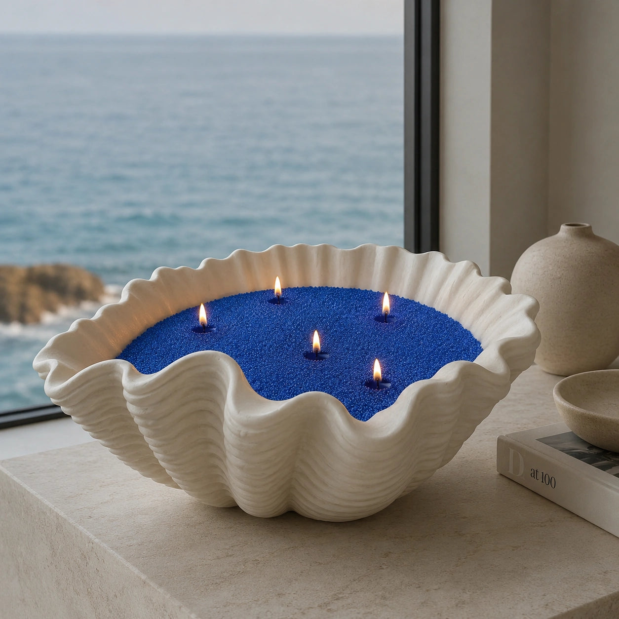 ocean blue pearled candle wax styled as a beautiful giftable candle scene