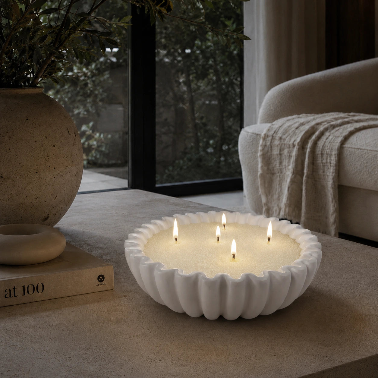 lemon yellow pearled candle wax styled in a cozy modern home decor scene
