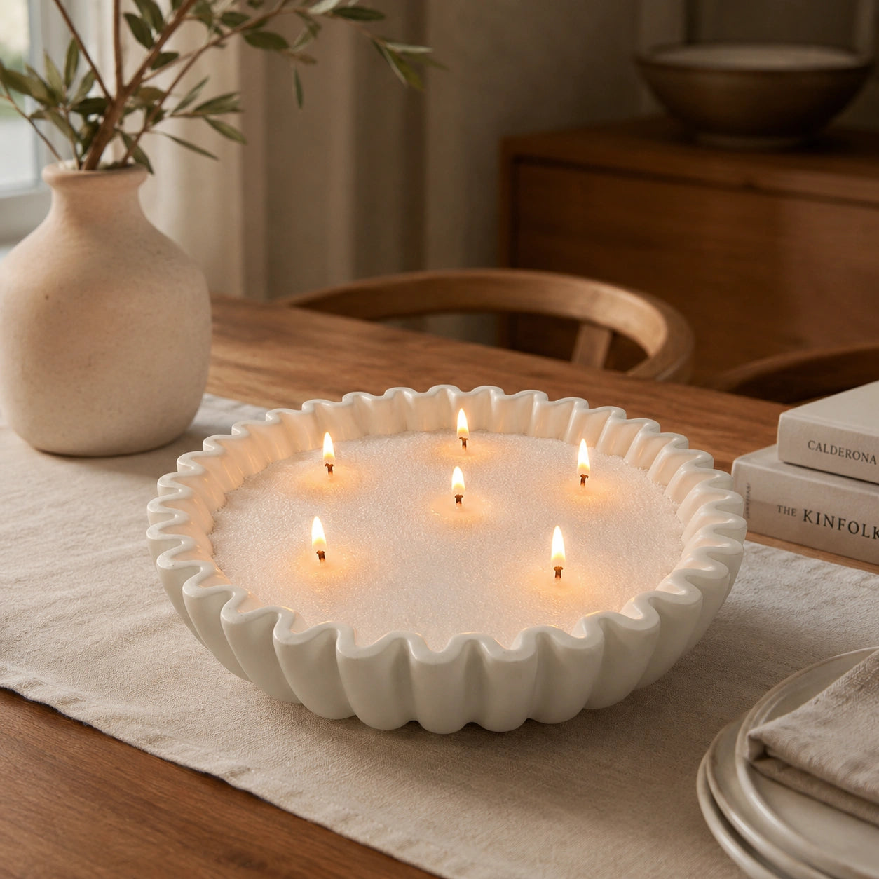 soft white pearled candle wax styled in a cozy modern home decor scene