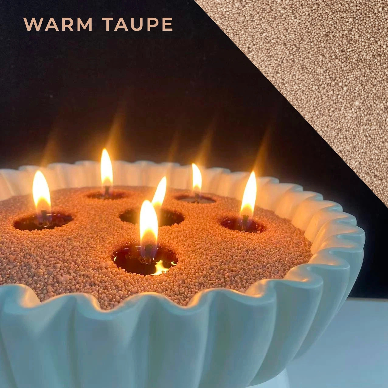 close-up of warm taupe pearled candle wax with a clean flame and visible wax pearls